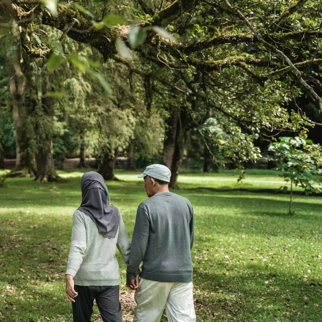 Man and woman walking outdoors