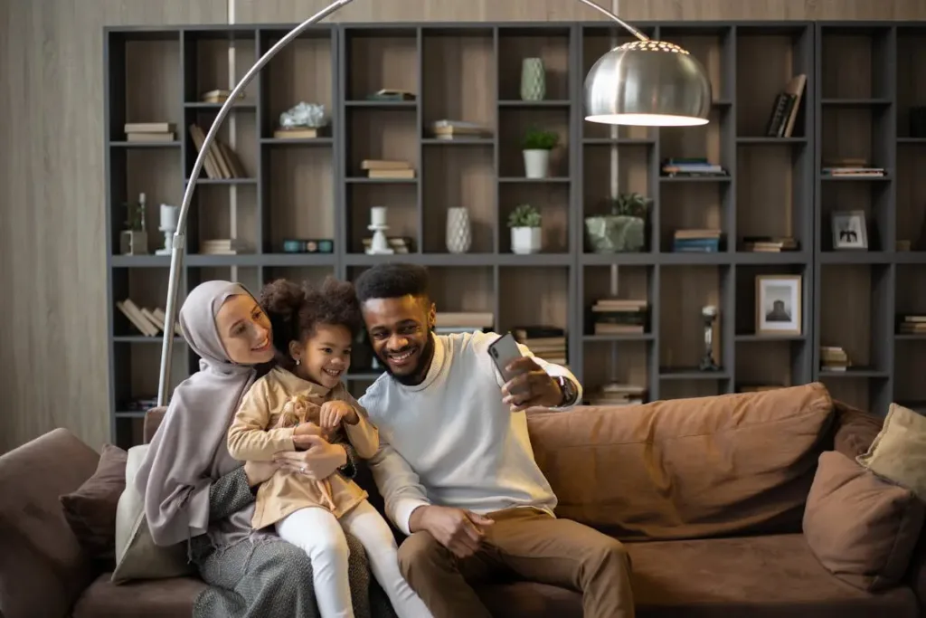 Advisor and happy couple with child