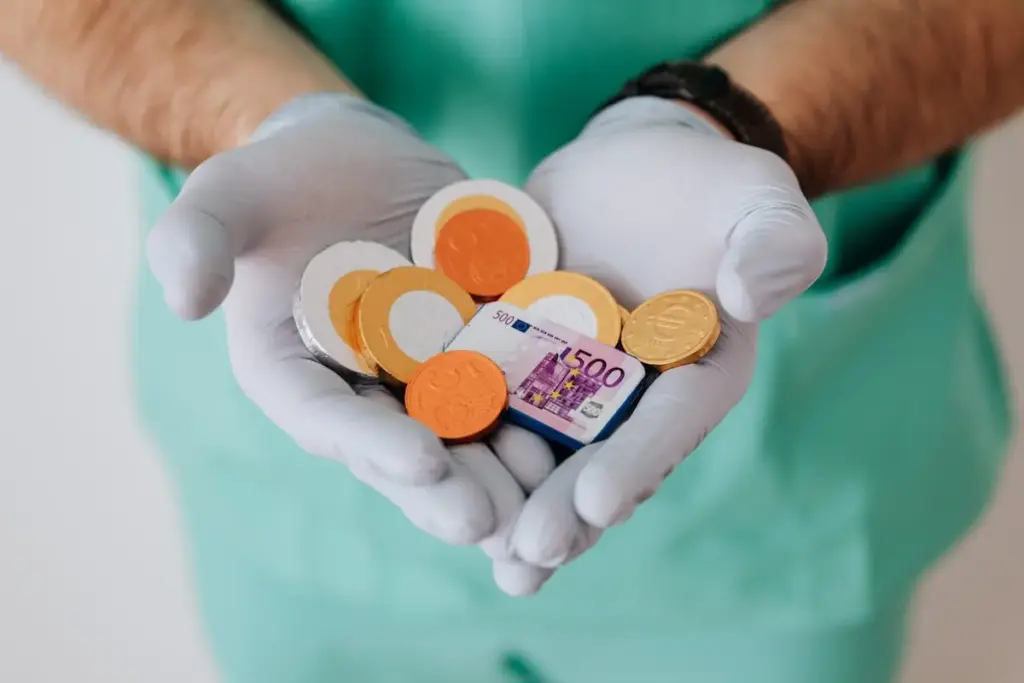 Gloves holding money